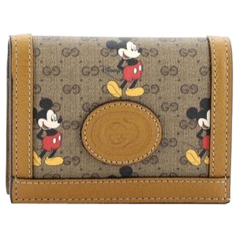 gucci mickey print wallet.